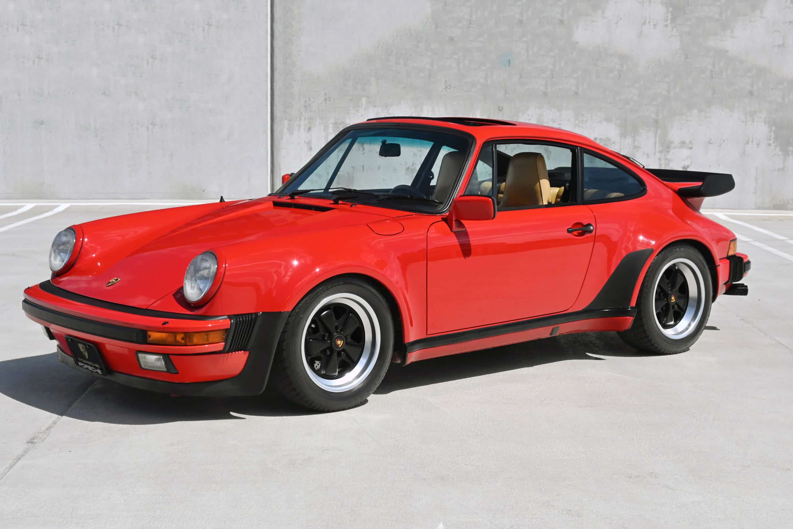 1986 Porsche 930 Red /Champagne Unmodified / 46K Actual Miles / Meticulous Ownership for 27 Years / Factory Sport Seats & LSD / Outstanding Condition / Dealer serviced